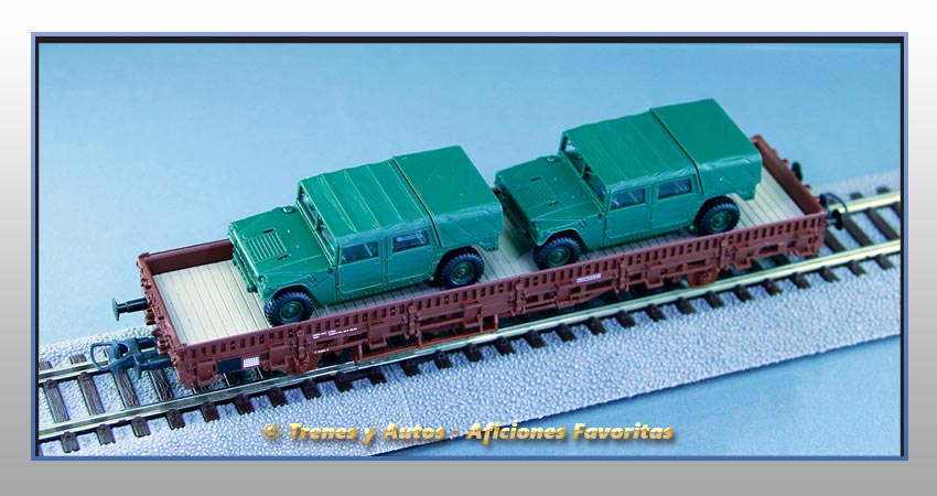 Vagón plataforma telero Tipo Ks Carga 2 vehículos Hummer - Renfe